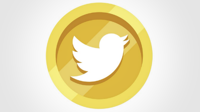 Der Twittervogel in einem goldenen Münze