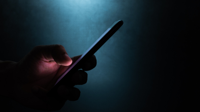 Smartphone in einer Hand